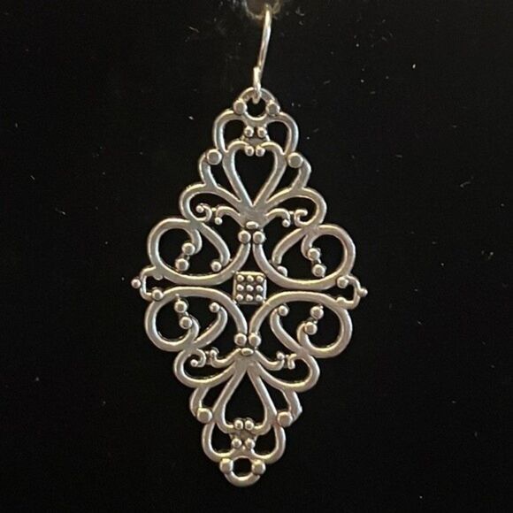 Handcrafted silver tone scroll earrings. - Picture 2 of 4